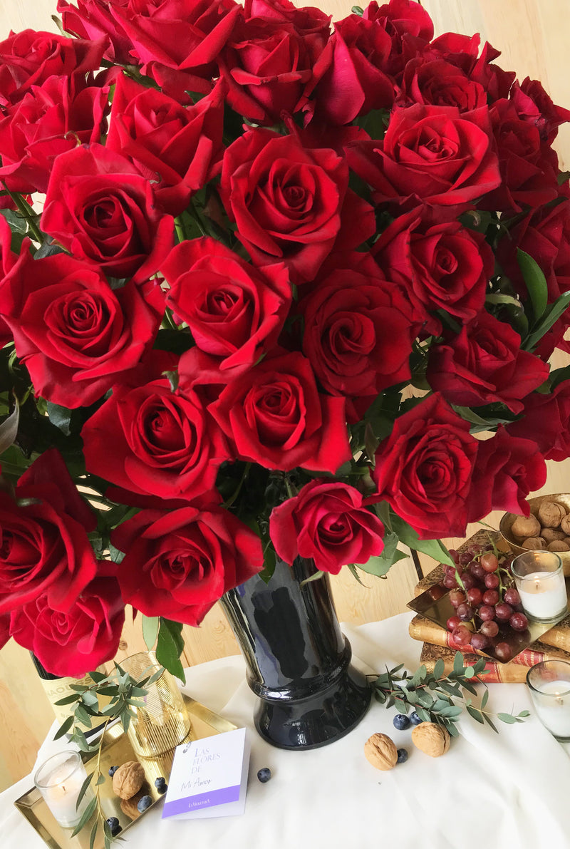 Constanza, 100 rosas rojas en arreglo floral