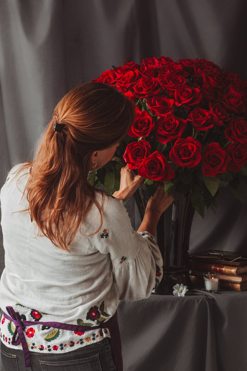 Constanza, 100 rosas rojas en arreglo floral