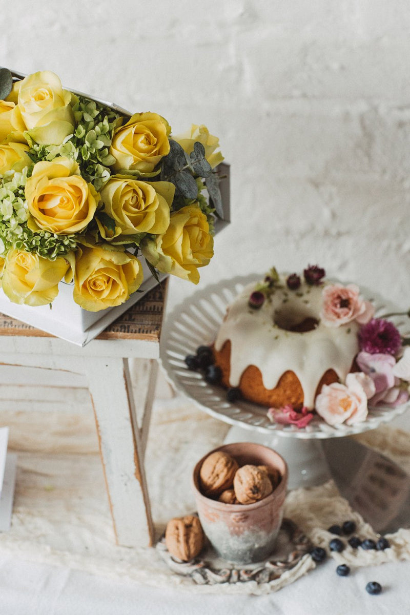 Regina, caja libro con rosas